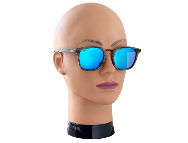 Bondi Oak sunglasses with blue lenses on female
