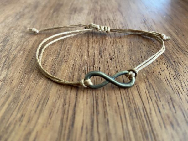 Brown rope bracelet with infinity charm