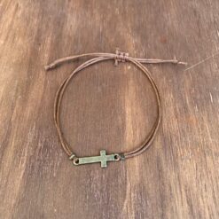 brown waxed rope bracelet with rustic cross charm
