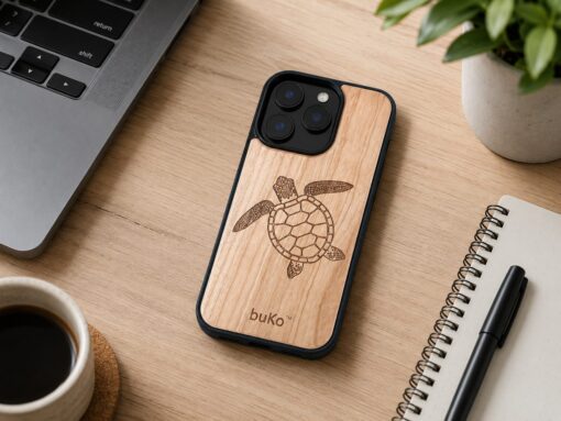 BuKo turtle wood phone case on a modern desk with laptop, coffee, notebook, pen and plant