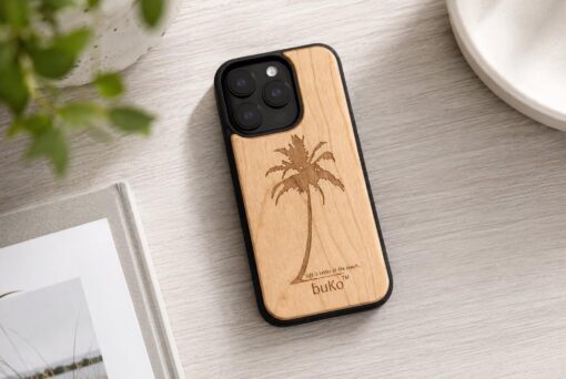buko wooden phone case with palm tree engraving on a clean white table