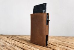 brown leather pop up wallet with side button by buko