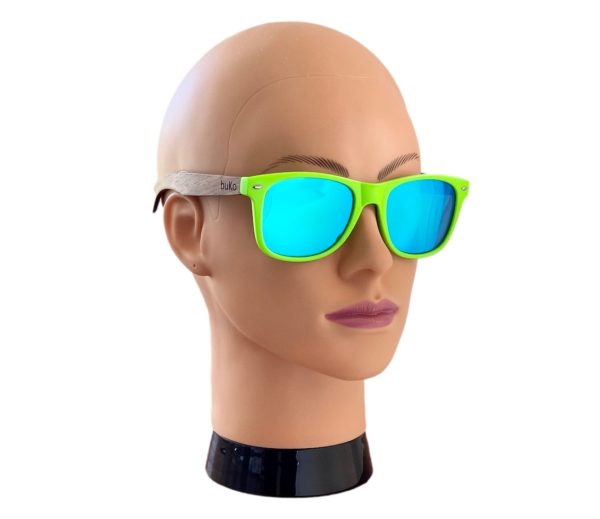 green wooden sunglasses on female model