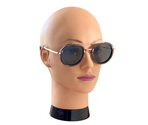 Luxe black wooden sunglasses on female model