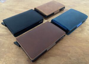 Four colours of pop up leather wallets