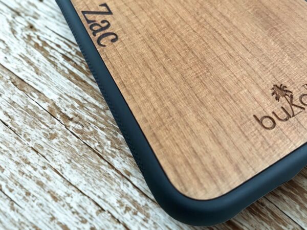 wooden phone case with the name 'zac' personalised on it