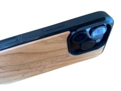 buttons on side of wooden case with whale