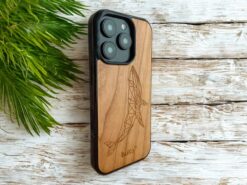 wooden phone case with whale design and whitewashed wood background