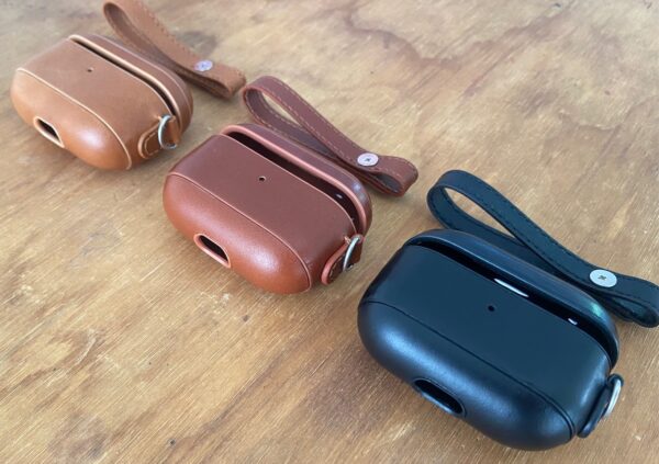 Brown and black leather AirPods cases