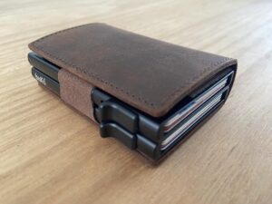 brown double pop up wallet