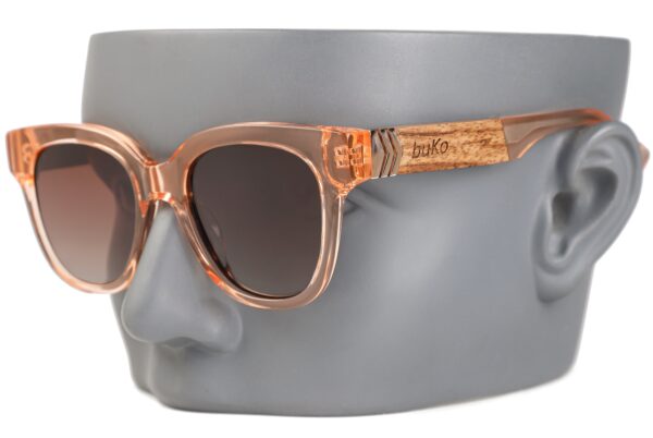 Wallis Fade wooden Sunglasses on a mannequin