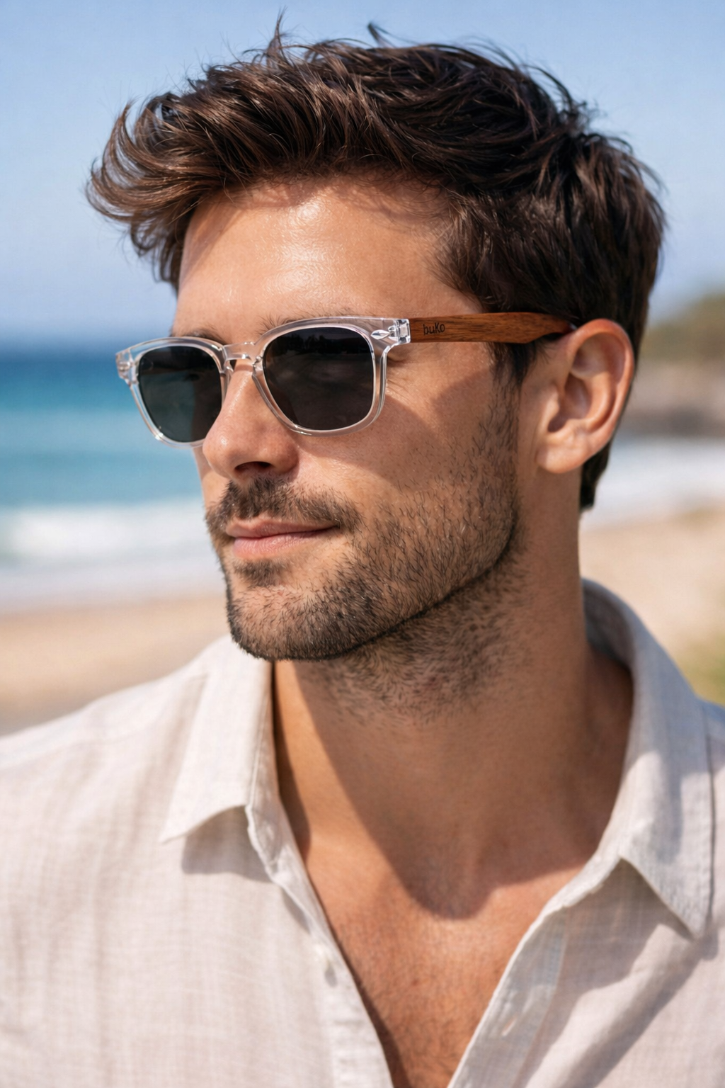 Byron sunglasses with wooden temples by buko on male model at the beach.