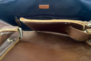 inside the buko leather duffle bag showing internal zip pocket