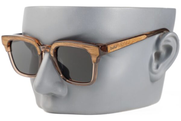 Bronte wooden sunglasses on a grey mannequin