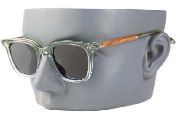 Varna green frame sunglasses on a mannequin