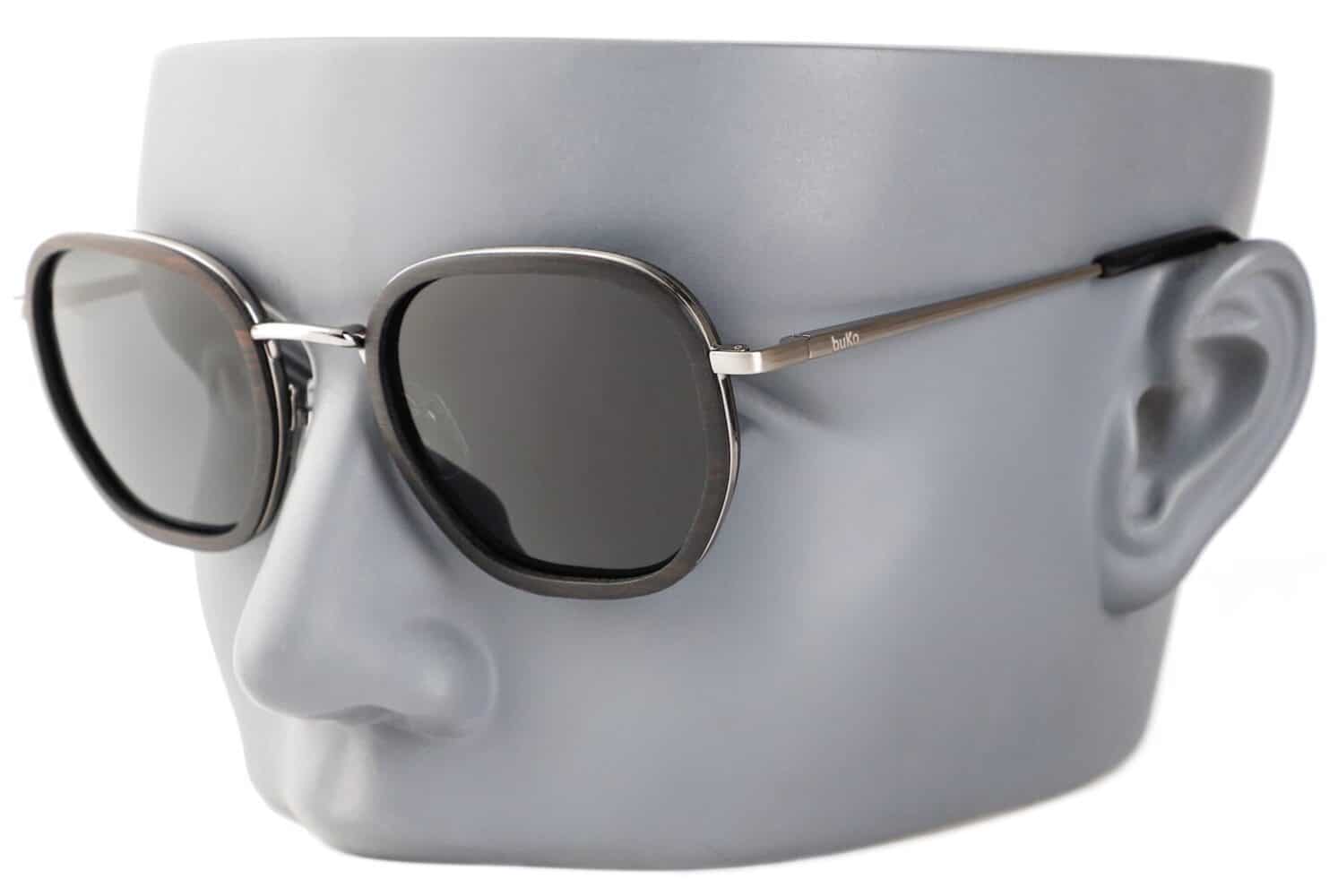 cali black sunglasses on a grey mannequin head