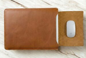 leather laptop case with mouse on opening flap