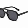 Black thin square aviator sunglasses with grey lenses and subtle buKo logo laser engraved on the right temple arm.