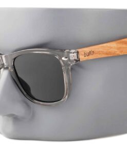 runaway fade wooden sunglasses with grey lenses on a male model