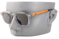 capri transparent sunglasses on grey mannequin head