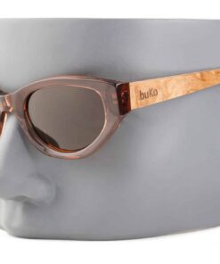Havana sunglasses with amber frame and wooden arms on a grey mannequin head