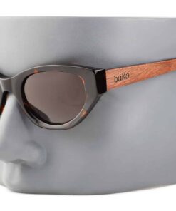 Havana sunglasses with tortoiseshell frame and wooden arms on a grey mannequin head