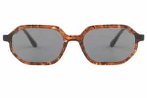 front of Sierra wood sunglasses by buko with grey lenses