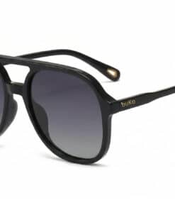 Buko Wategos sunglasses in black acetate frame with grey polarised lenses and arched double bridge