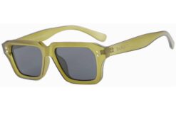 Transparent green Cove sunglasses made from recycled PET with dark polarised lenses and square frame by buKo