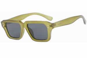 Transparent green Cove sunglasses made from recycled PET with dark polarised lenses and square frame by buKo