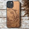 Dolphin engraved wood phone case with ocean wave design by Buko