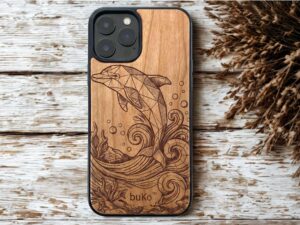 Dolphin engraved wood phone case with ocean wave design by Buko