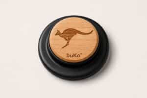 buKo MagSafe Phone Holder & Stand with natural wood kangaroo engraving and matte black base
